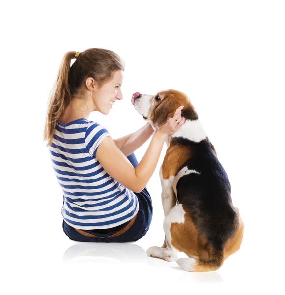 Dog and woman in studio — Stock Photo, Image