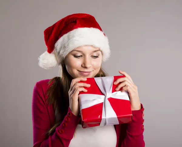 Beautiful christmas woman with gift — Stock Photo, Image