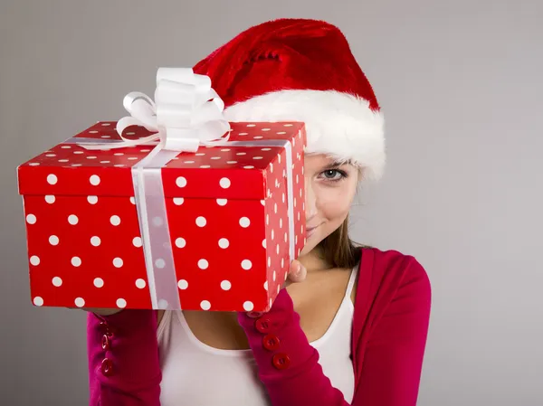 Beautiful christmas woman with gift — Stock Photo, Image