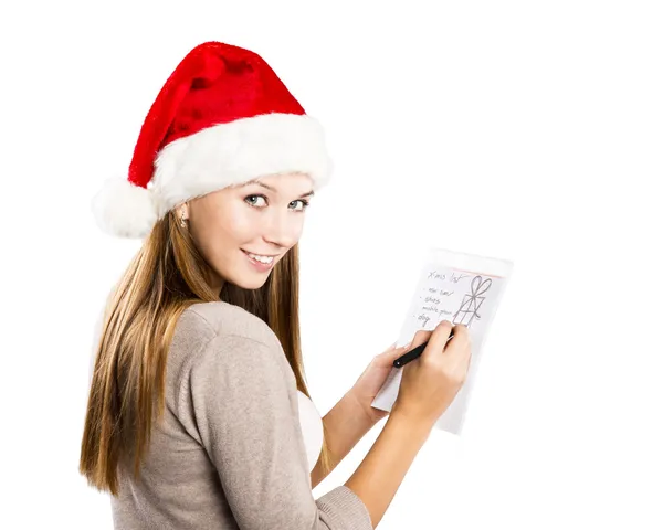 Beautiful woman with christmas hat Royalty Free Stock Photos