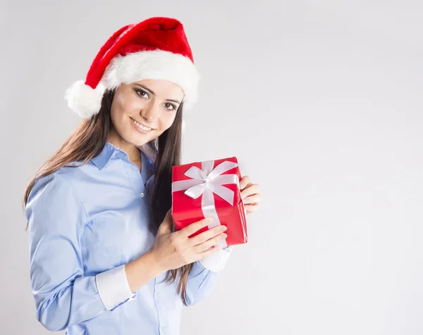 Beautiful woman with christmas gift — Stock Photo, Image