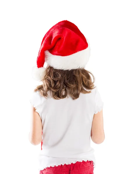 Niña en sombrero de santa con regalo de Navidad —  Fotos de Stock