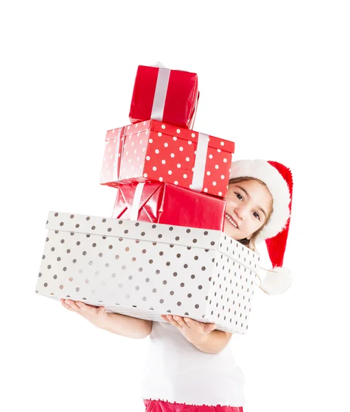 Petite fille en chapeau de Père Noël avec cadeau de Noël — Photo