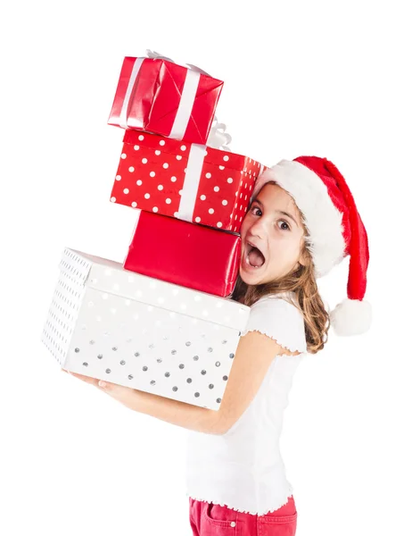 Small girl in santa hat with christmas gift — Stock Photo, Image