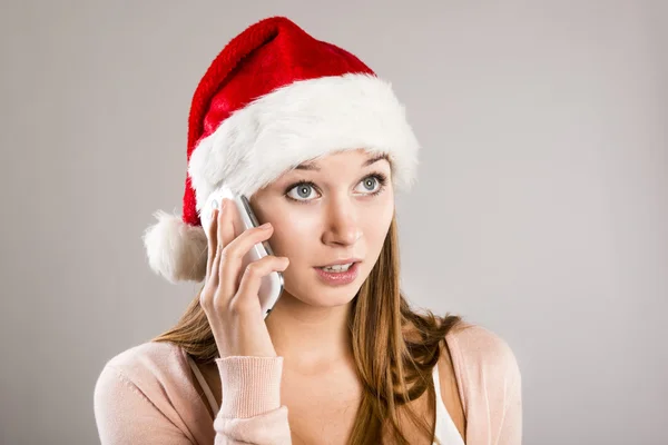 Piękna kobieta z hat Bożego Narodzenia — Zdjęcie stockowe