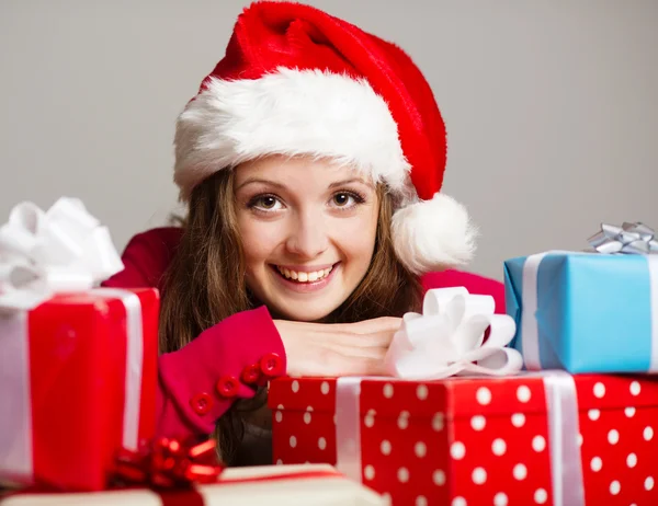 Cute girl with christmas presents — Stock Photo, Image