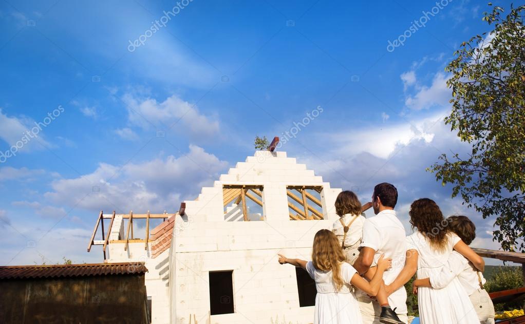Family building a new house