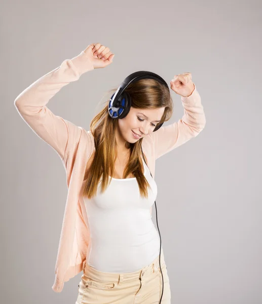 Girl with headphones — Stock Photo, Image