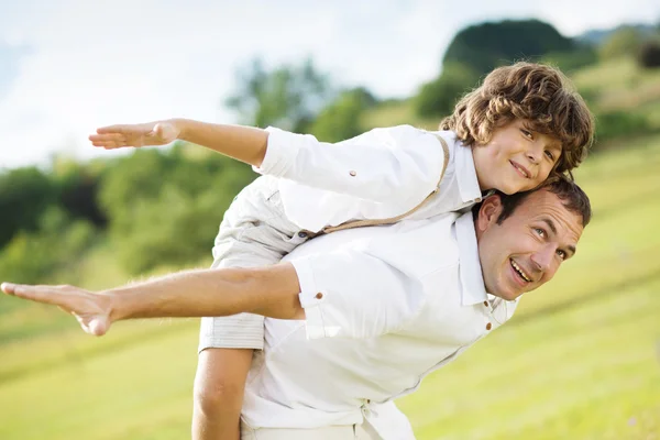 Father and son playing — Stock Photo, Image
