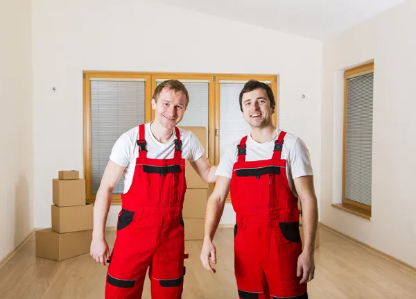 Movers in new house — Stock Photo, Image