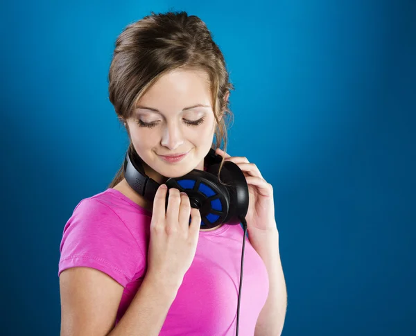 Girl with headphones — Stock Photo, Image