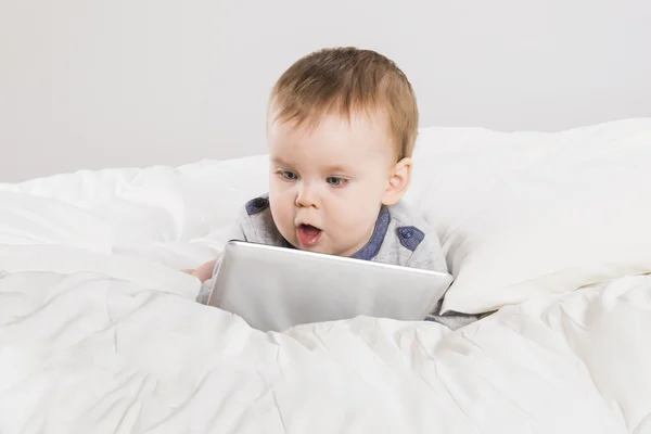 Baby with digital tablet — Stock Photo, Image