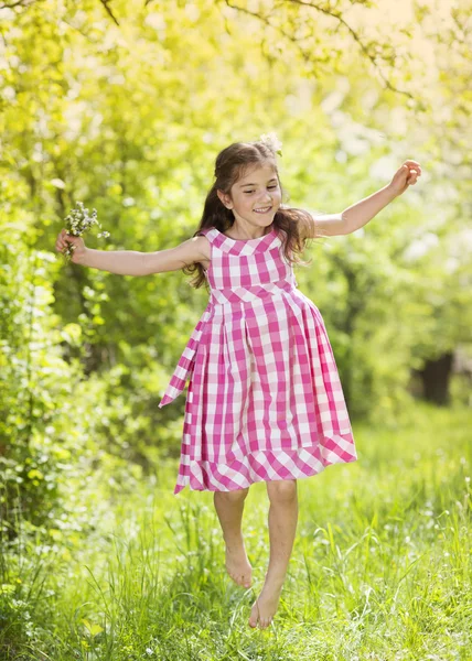 Girl with flowers — Stock Photo, Image