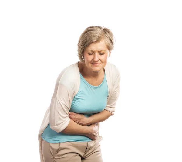 Mujer con dolor de estómago — Foto de Stock