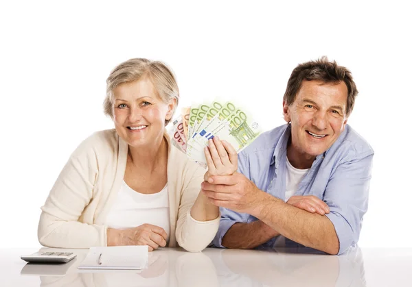 Senior couple with money — Stock Photo, Image