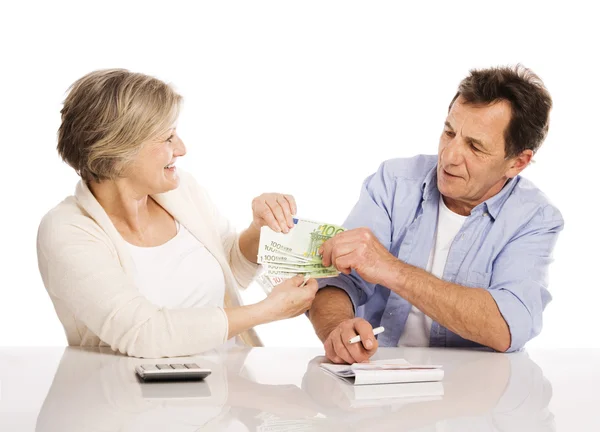 Senior couple with money — Stock Photo, Image