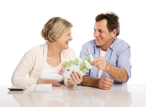 Senior couple with money — Stock Photo, Image