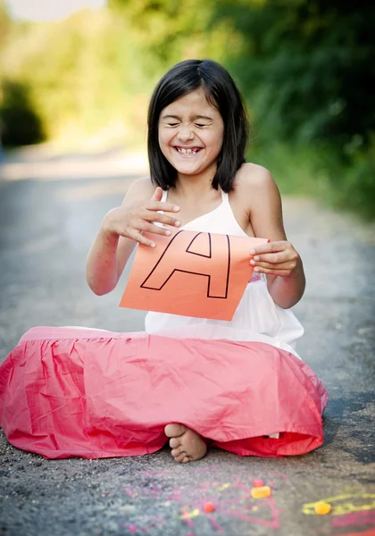 Little girl in park — Stock Photo, Image