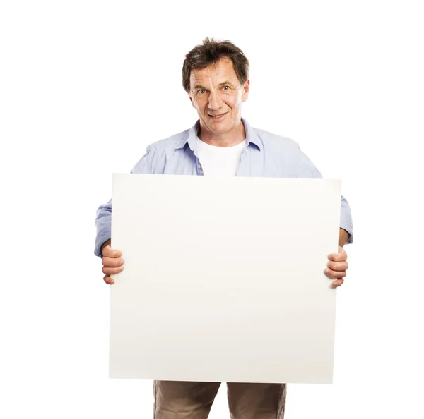 Senior man with advertising board — Stock Photo, Image