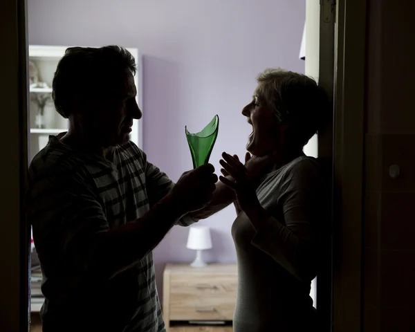 Silhouette of mature couple fighting — Stock Photo, Image