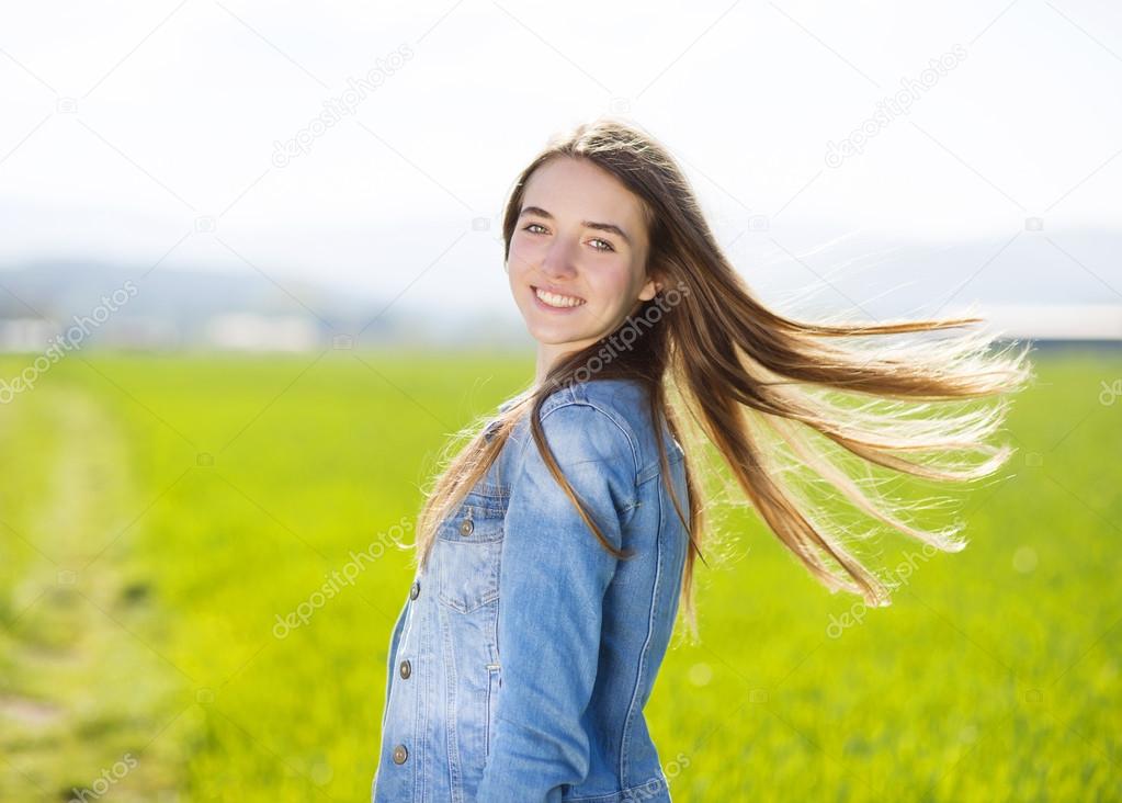 Girl in green field