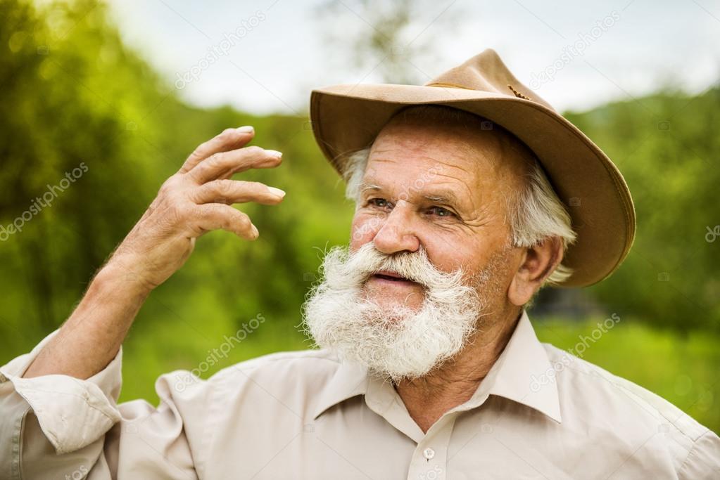 Old farmer in hat