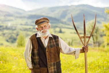 yaşlı çiftçi holding Orak