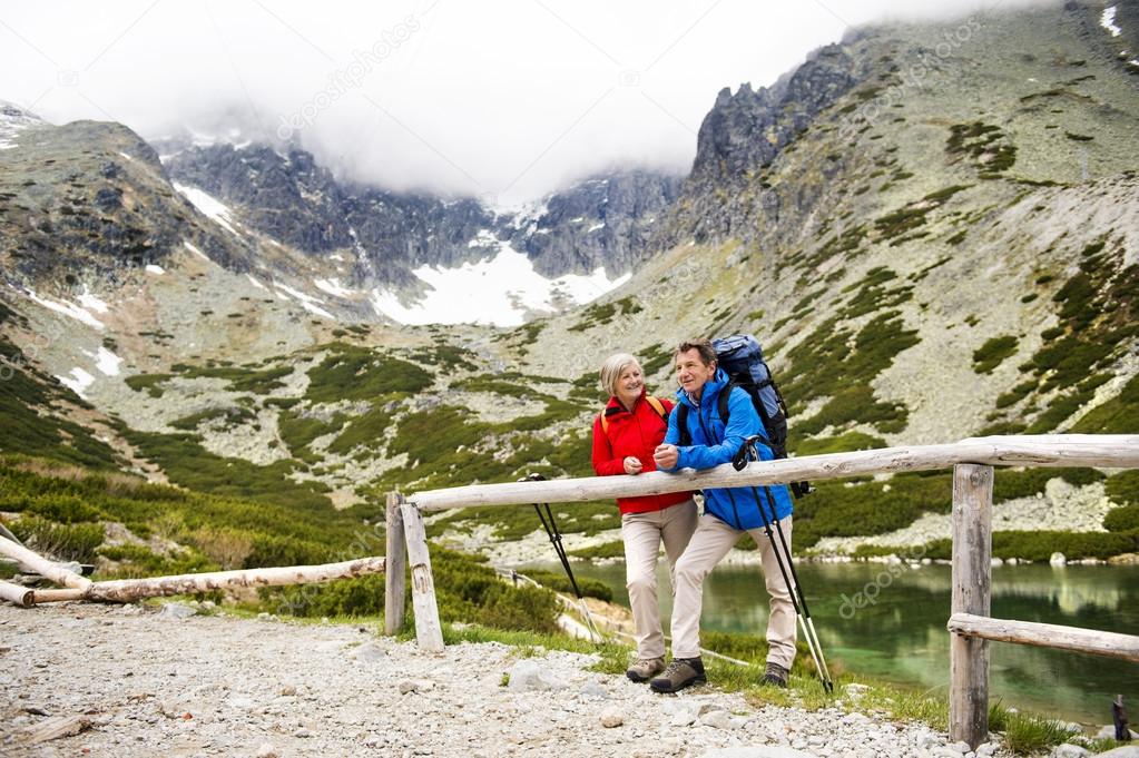 Couple enjoy the view at mountains