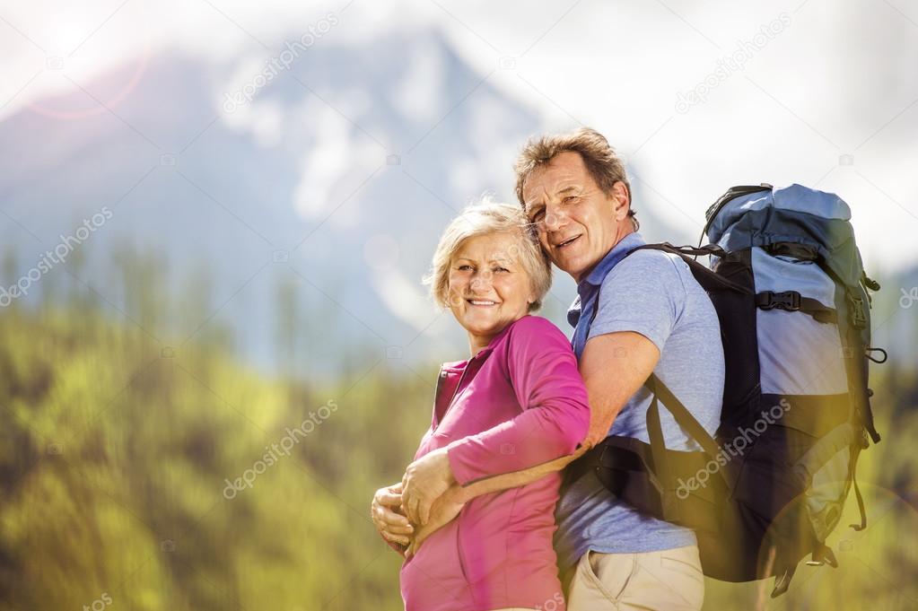Couple hiking at mountains