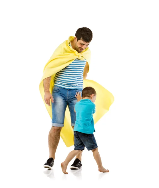 Father as hero with his son — Stock Photo, Image