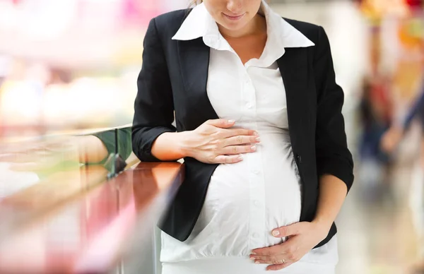 Woman holding her belly — Stock Photo, Image