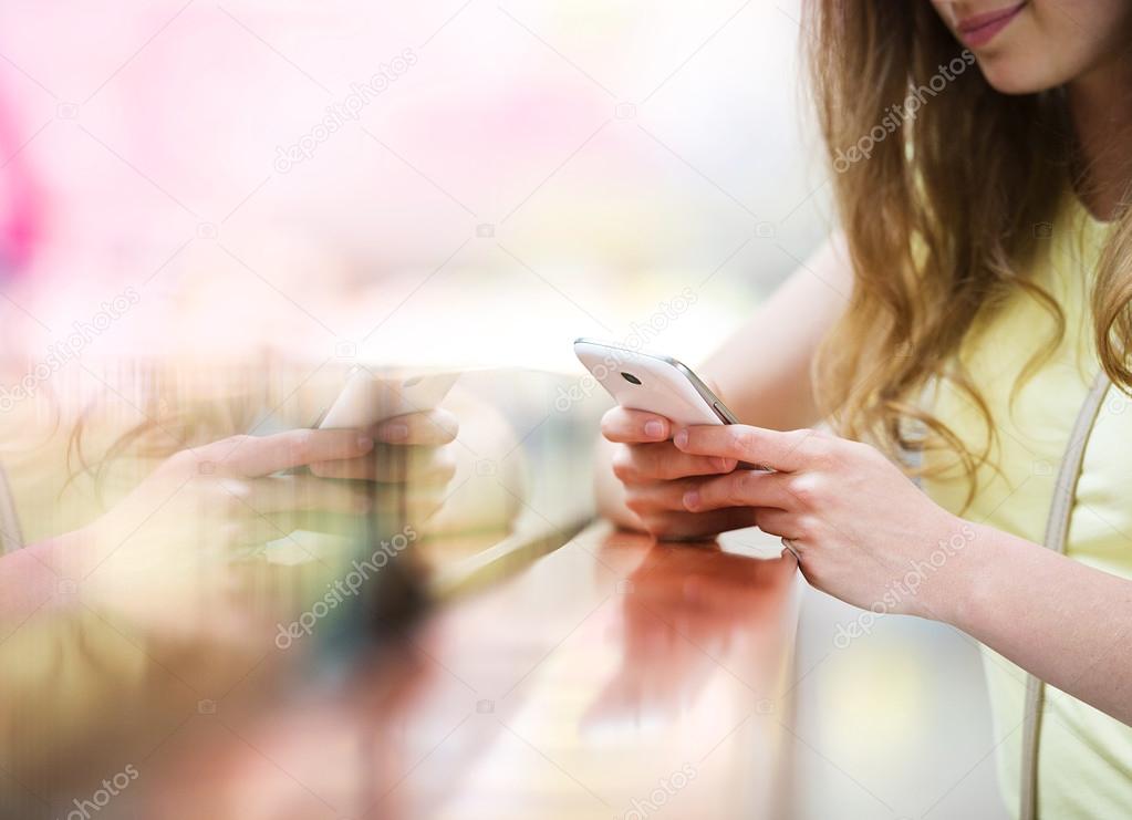 Woman messaging on phone