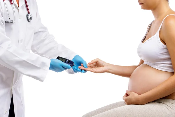 Woman being given prenatal check by doctor — Stock Photo, Image