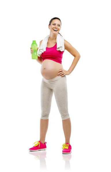 Pregnant woman holding mat — Stock Photo, Image