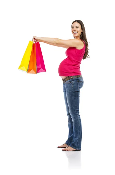 Pregnant woman with shopping bags — Stock Photo, Image