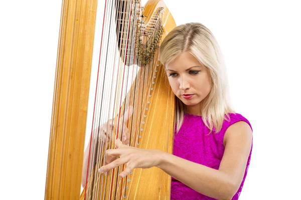 Femme élégante jouant de la harpe — Photo