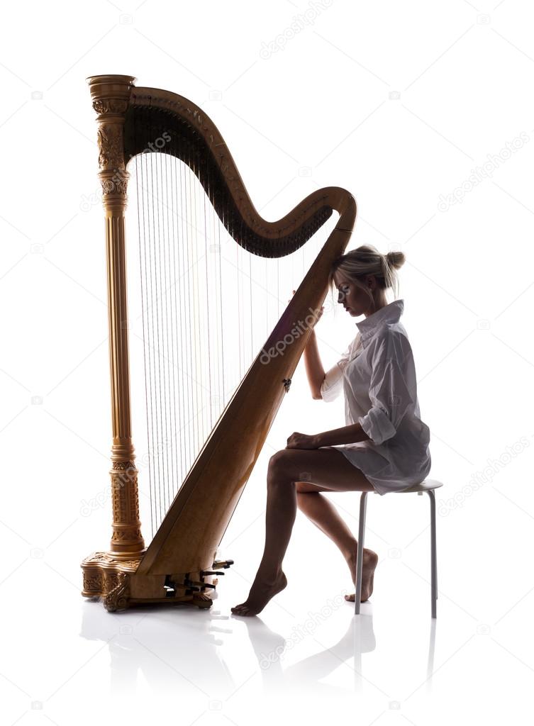 Woman playing the harp