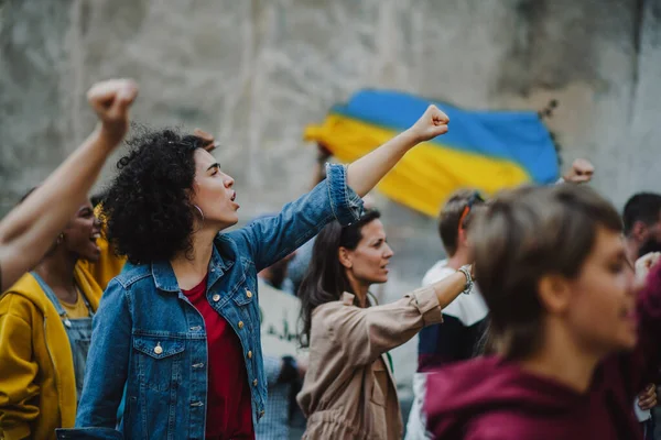 stock-photo-crowd-of-activists-protesting-against