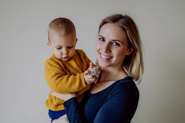 Happy young mother with little son looking at camera. — Stock Fotó
