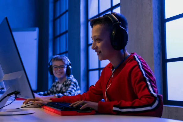 Young Gamer Boys Headphones Playing Computer Video Game — Stockfoto