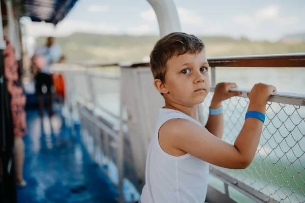 Little Curious Boy Looking Water Motor Boat — Fotografia de Stock