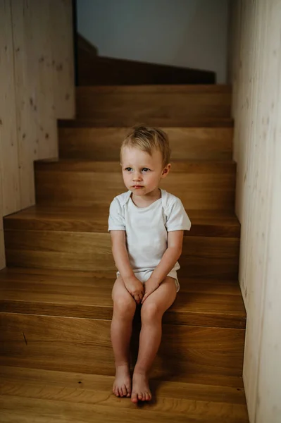 Cute Little Girl Sitting Stairs Home Looking Camera — Foto de Stock