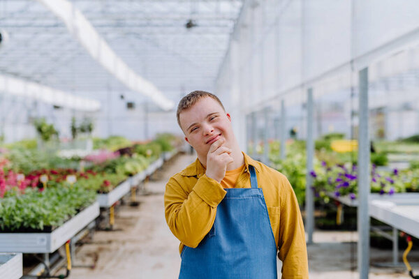 Young Employee Syndrome Working Garden Centre Looking Camera Stock Photo
