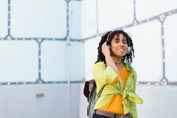 Young Biracial Woman Wearing Headphones Enjoying Listening Music Outdoors Street — Stock Photo, Image