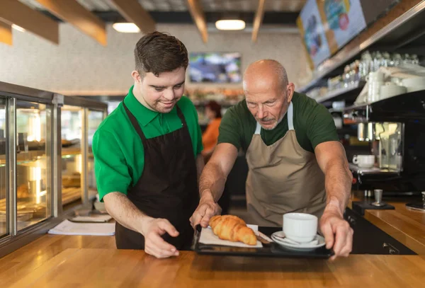 Happy Waiter Syndrome Serving Coffee Help His Collegue Cafe — Foto Stock