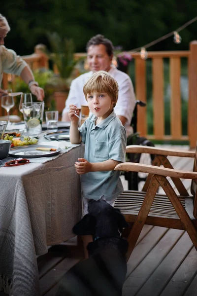 Family Eating Barbecue Party Dinner Patio Little Boy Eating Grilles — Stock Photo, Image