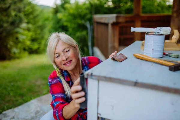 Senior Woman Cleaning Garden Furniture Getting Garden Ready Summer — Stock Photo, Image