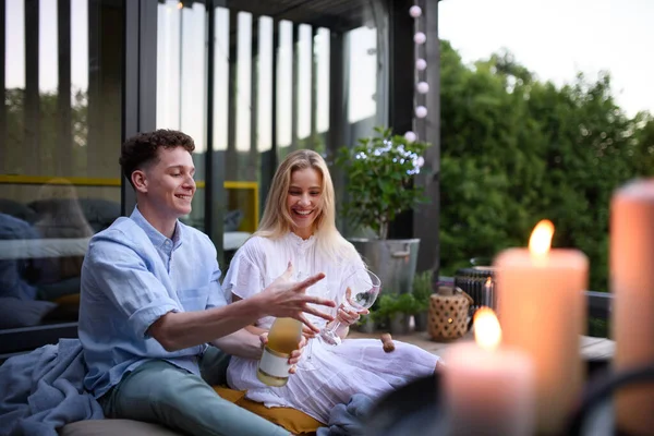 Young Couple Opening Bottle Champagne Outdoors Celebrating Weekend Away Tiny — Stockfoto