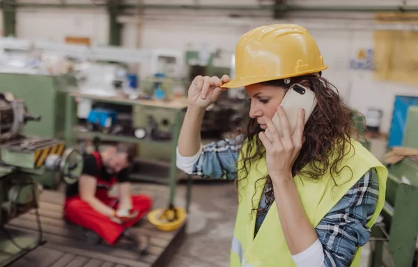 Woman Calling Ambulance Her Colleague Accident Factory First Aid Support — 스톡 사진