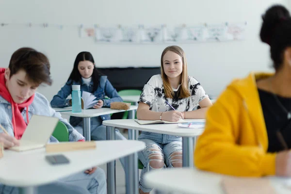 High School Students Paying Attention Class Sitting Desks Writing Notes — Stock Photo, Image